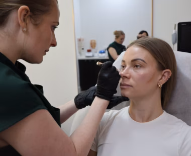 Assessing her tear trough to plan out PRF treatment